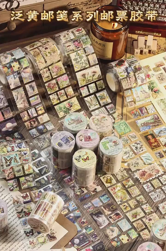 Yellowed letter paper, retro gold-stamped washi tape for DIY scene-making in bullet journals, bullet journal sticker rolls, plant and animal stickers, retro postage stamps.